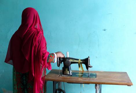 Rahima (pseudonym) works at a garment factory and frequently does twelve-hour shifts.
